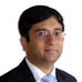 Rajeev Thakkar,Chief Investment Officer and Director